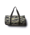 Day Tripper 29 Liter Duffle Bag made of durable polyester material with Nylon handles and removable shoulder strap in Tiger Camo