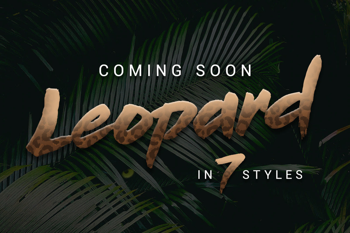 Coming Soon: Leopard in 7 Styles, written in leopard-print lettering over dark palm leaves with a leopard’s eye peeking through.