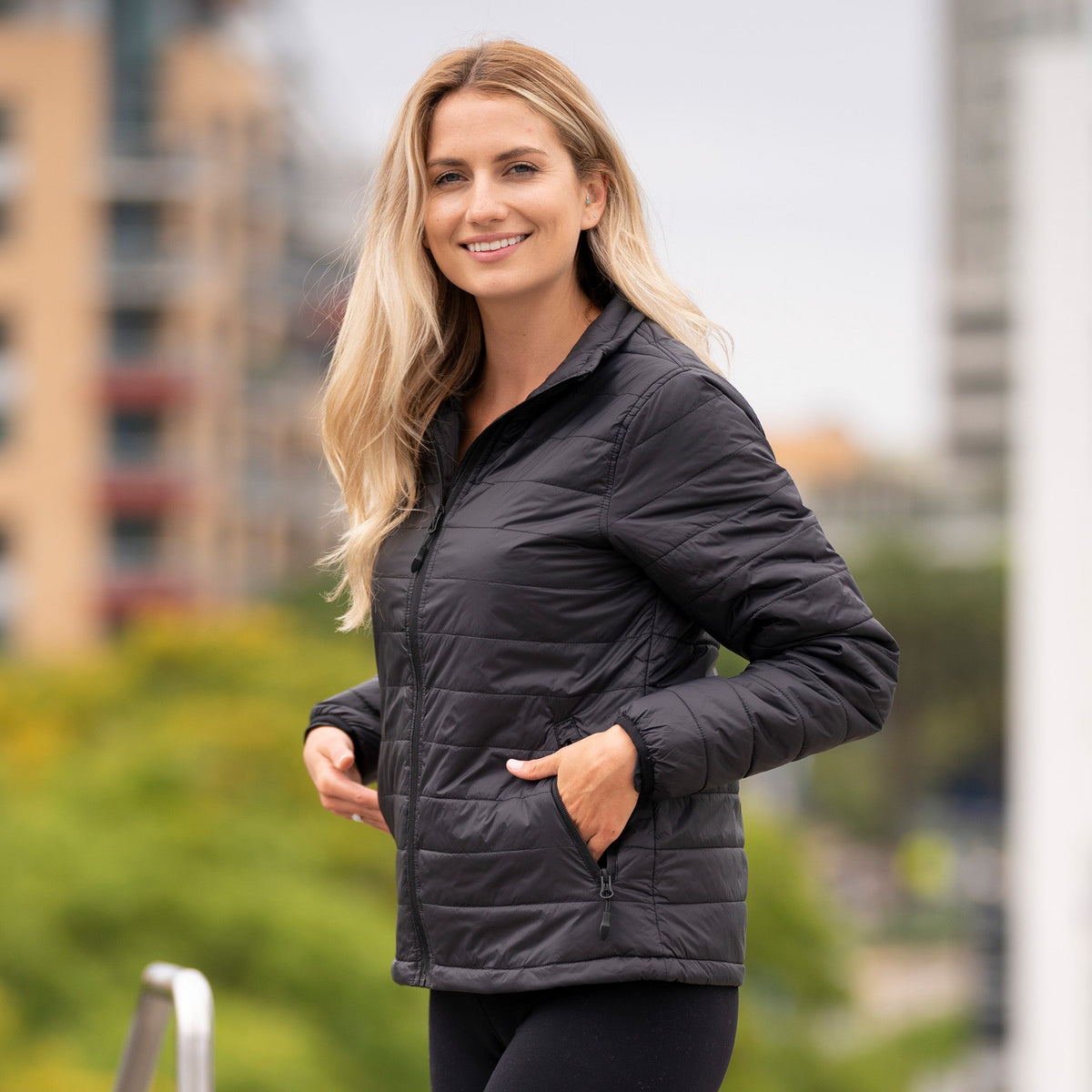 Women’s blank black puffer jacket with full front zip