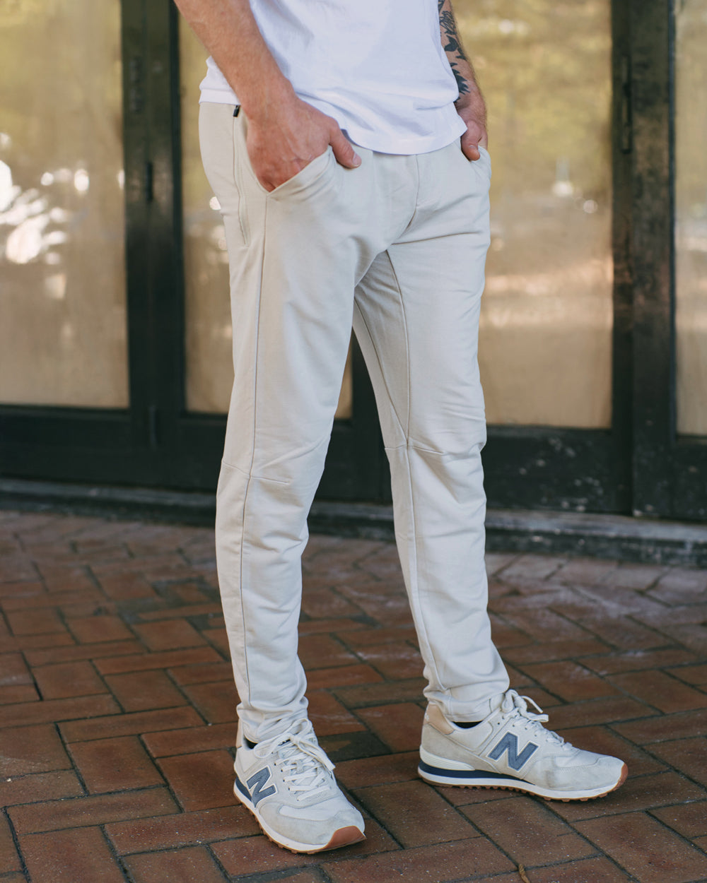 man wearing a light color sweat pant