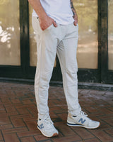 man wearing a light color sweat pant