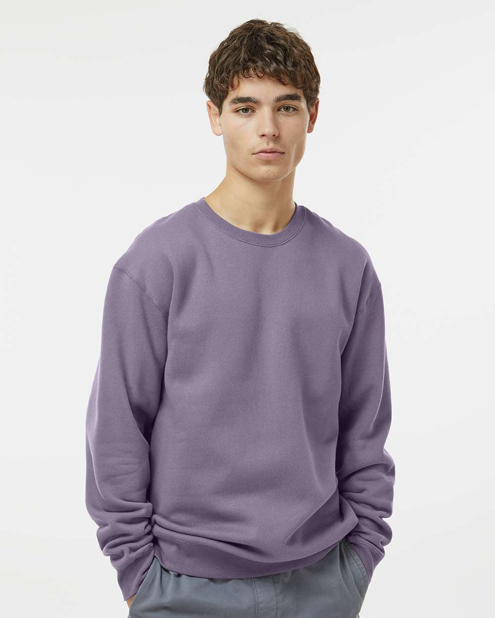 Man wearing a Plum color 10oz. Heavyweight Crew - Independent Trading Company