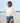 Independent Trading Co. PRM2700 Womens California Wave Wash Sunday Crew Neck Sweatshirt in color Bone on woman at the beach.