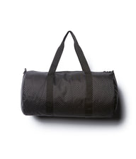 Day Tripper 29 Liter Duffle Bag made of durable polyester material with Nylon handles and removable shoulder strap in Polka Dot